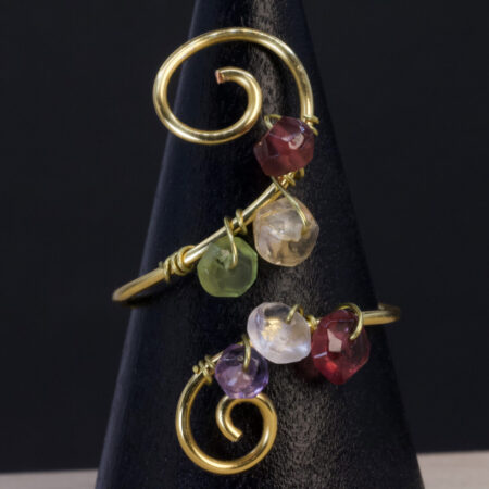 Anello in peridoto, quarzo citrino, granato e ametista | spirale multigemma