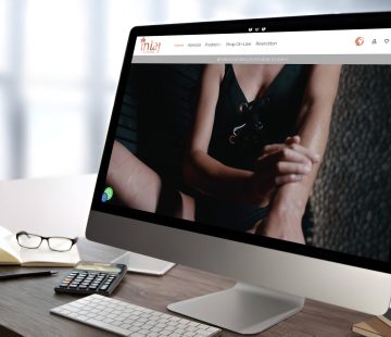 Mockup sito e-commerce INTAJ Cosmetics con design rame lucido